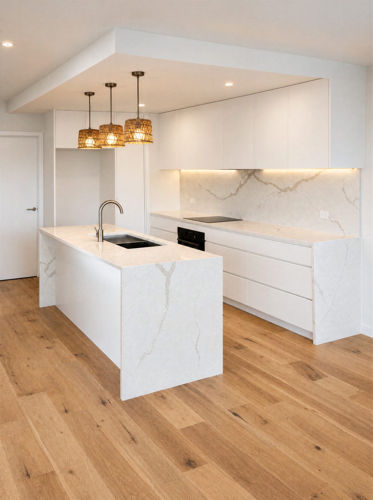Kitchen island with waterfall stone ends