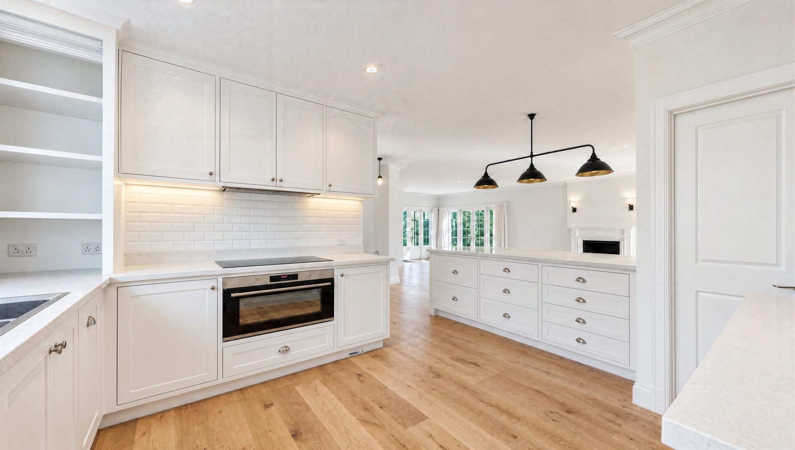 White Shaker kitchen with a long island of drawers