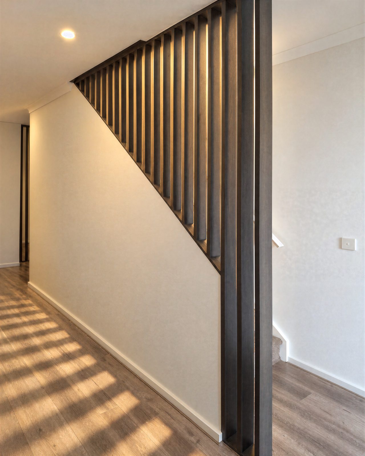 Dark timber batten screen